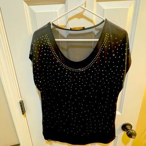 Black and a golden shiny blouse